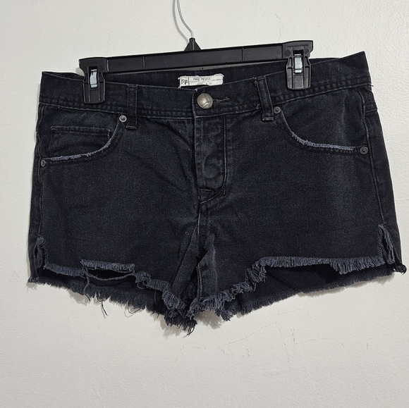 Free People Pants - Free People Black Sharkbite denim shorts. Size W 28